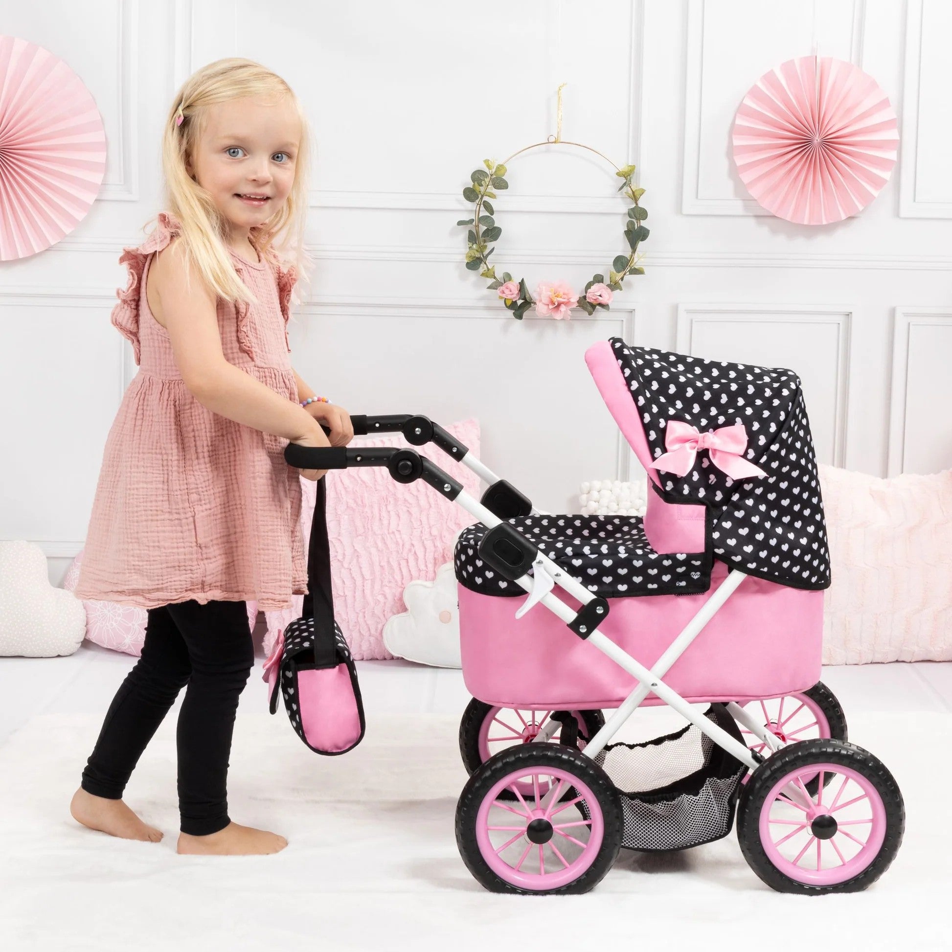 Bayer - Doll Pram Trendy Pink with Black Hood & Pink Bow