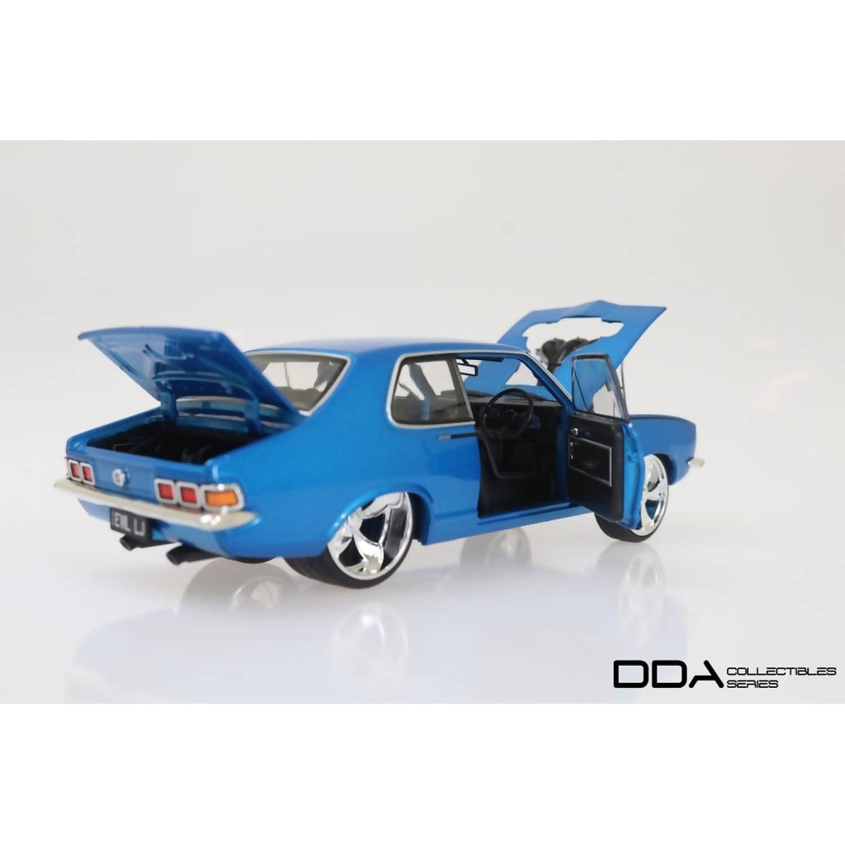 DDA COLLECTIBLES - 1:24 SCALE - METALLIC BLUE EVIL LJ 1973 HOLDEN LJ TORANA - DIECAST MODEL