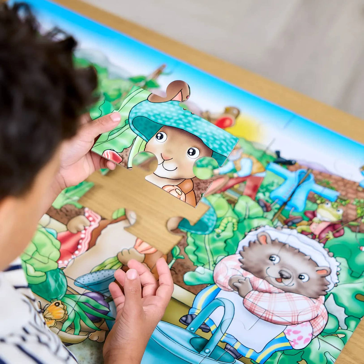 Orchard Toys - Peter Rabbit In Mr. McGregor's Garden jigsaw puzzle 25 Pieces